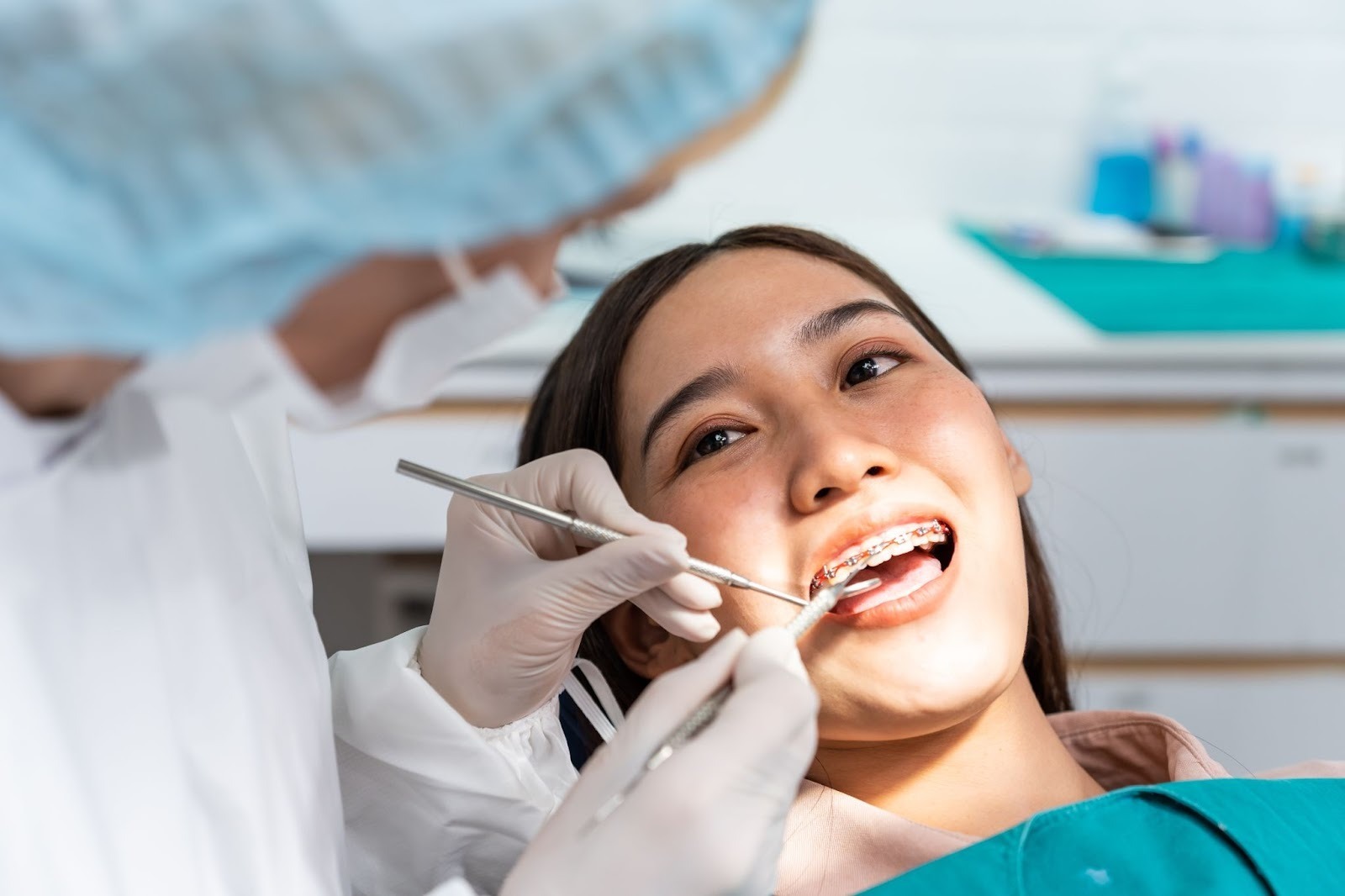 Patient receiving orthodontic care with braces at Lakepointe Orthodontics, emphasizing personalized treatment options for Invisalign and braces in Warren, MI.